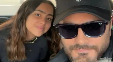 1762428911 تامر حسني يشارك جمهوره رحلته لفرنسا مع ابنته