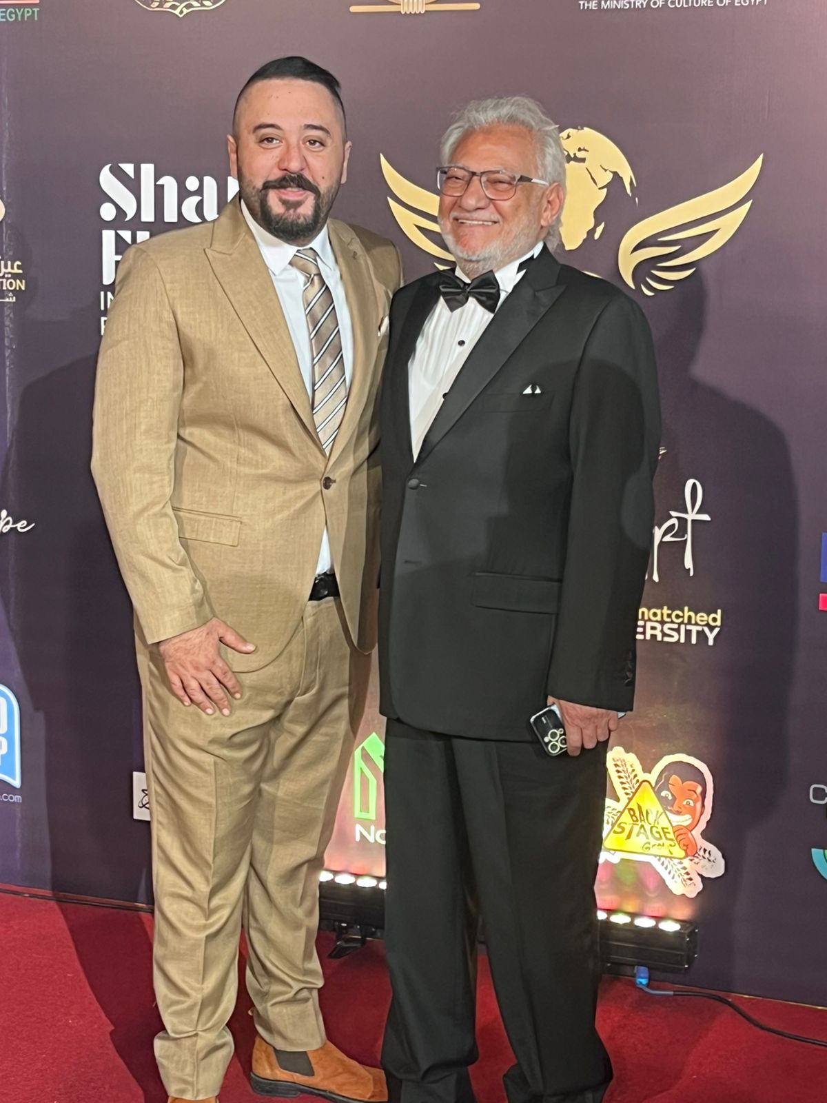 1764090807 578 الصريطي وعمرو عبد العزيز يتألقوا على السجادة الحمراء في مهرجان