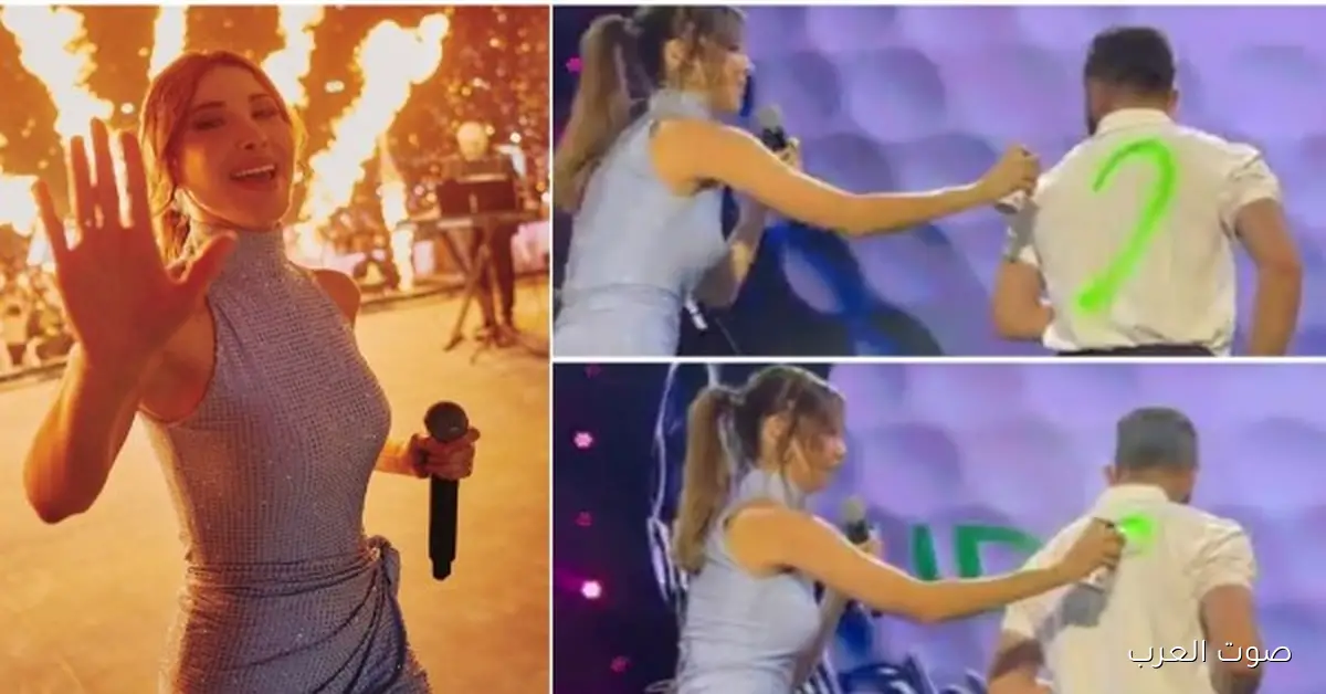 معجب يفاجئ نانسي عجرم على المسرح بهدية قلب مرسوم