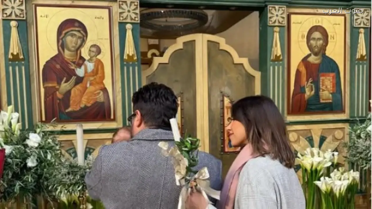 دانيلا رحمة وناصيف زيتون يحتفلان بعيد ميلاد إلياس في الكنيسة